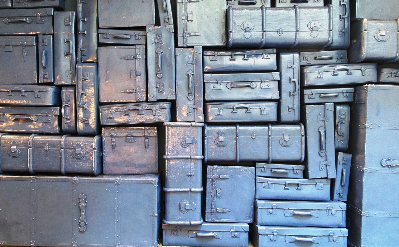 Stack of vintage blue suitcases.